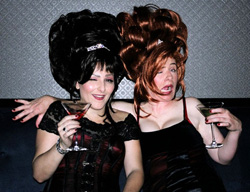 Queen of Clubs divas Kasandra Vanel as Queen Kasandra and Caroline Waters as Queen Caroline